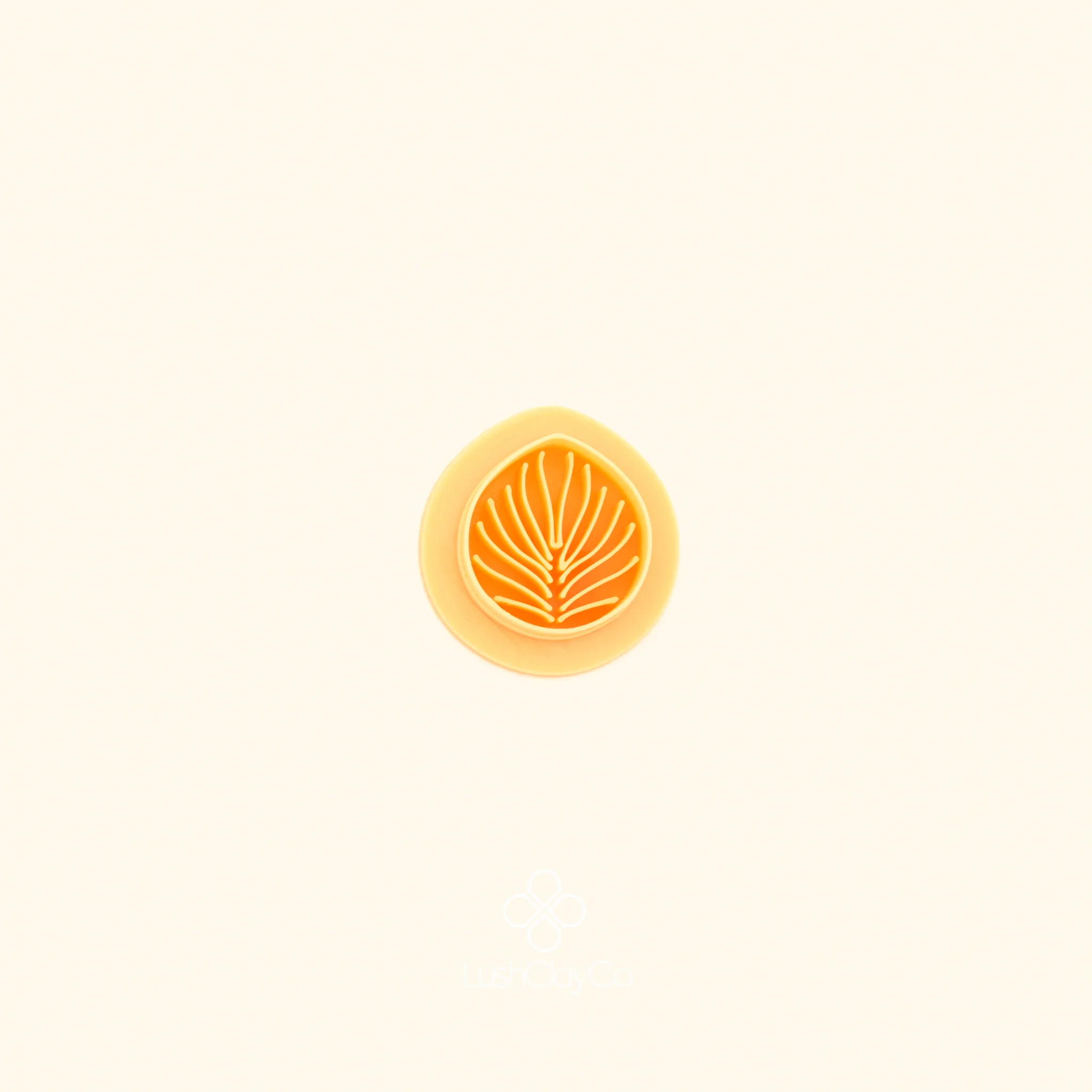 Ritim Palmet polymer clay cutter showing single rounded palmet leaf with fine interior radiating lines and clean outer silhouette