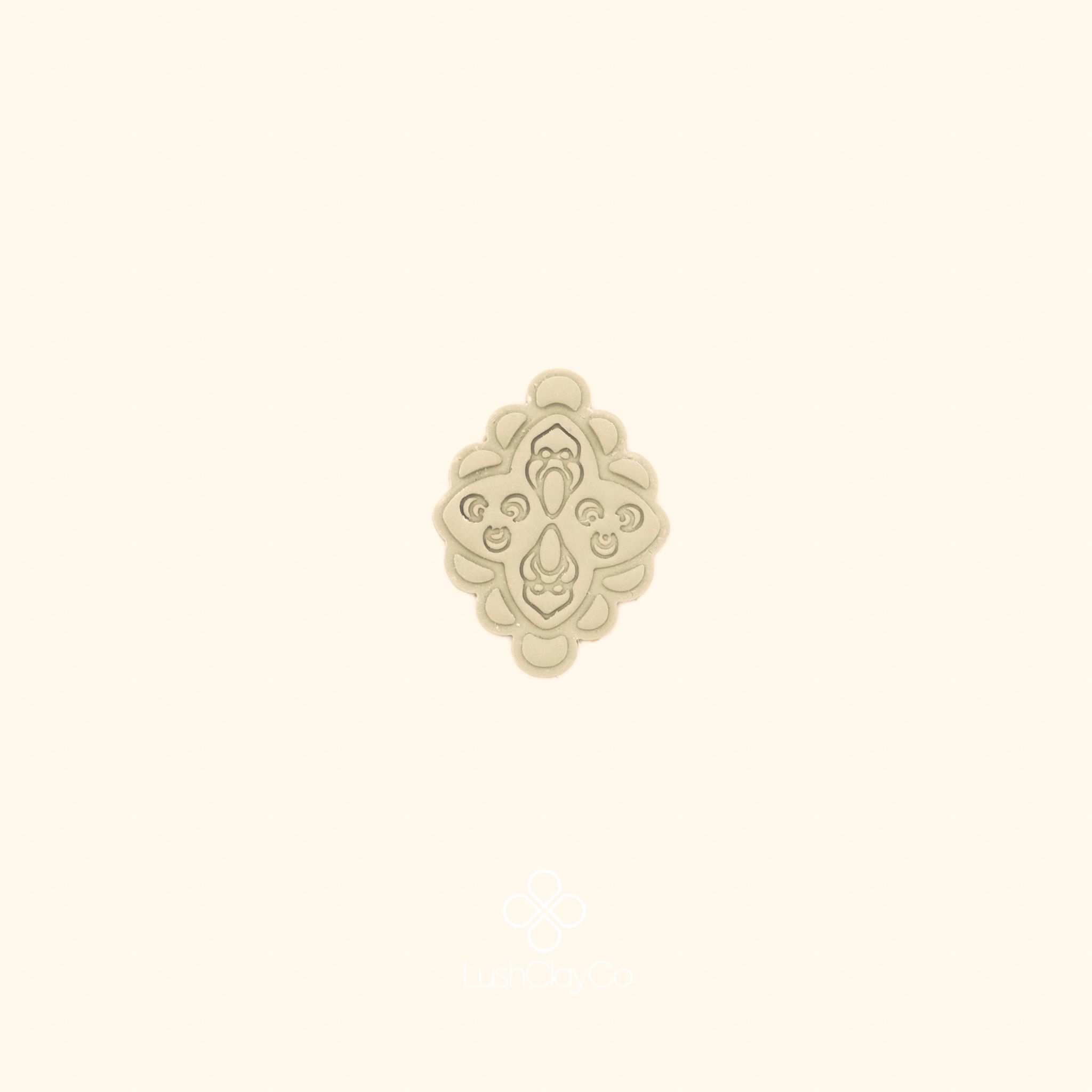 Clay impression of the Çarkı Madalyon ottoman medallion cutter showing crisp radial detail and scalloped edge