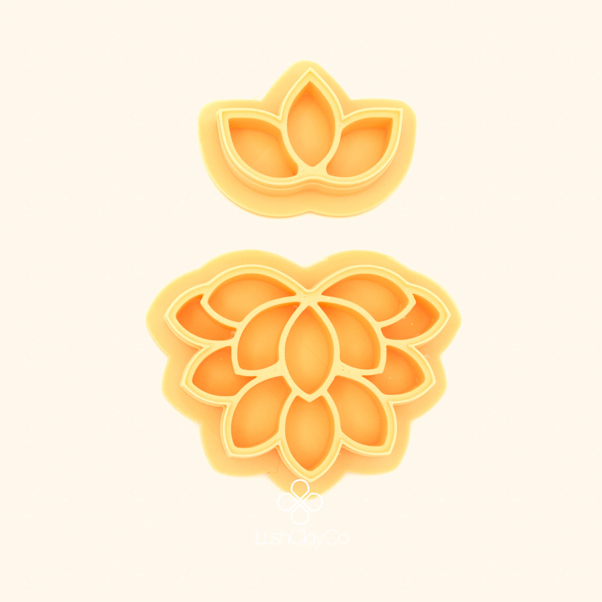 Nilüfer Deste two piece botanical polymer clay cutter set showing small crown companion and large multi tiered lotus bloom cutter