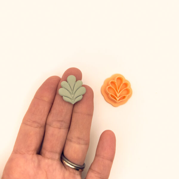 nadir-emblem-polymer-clay-cutter-in-hand