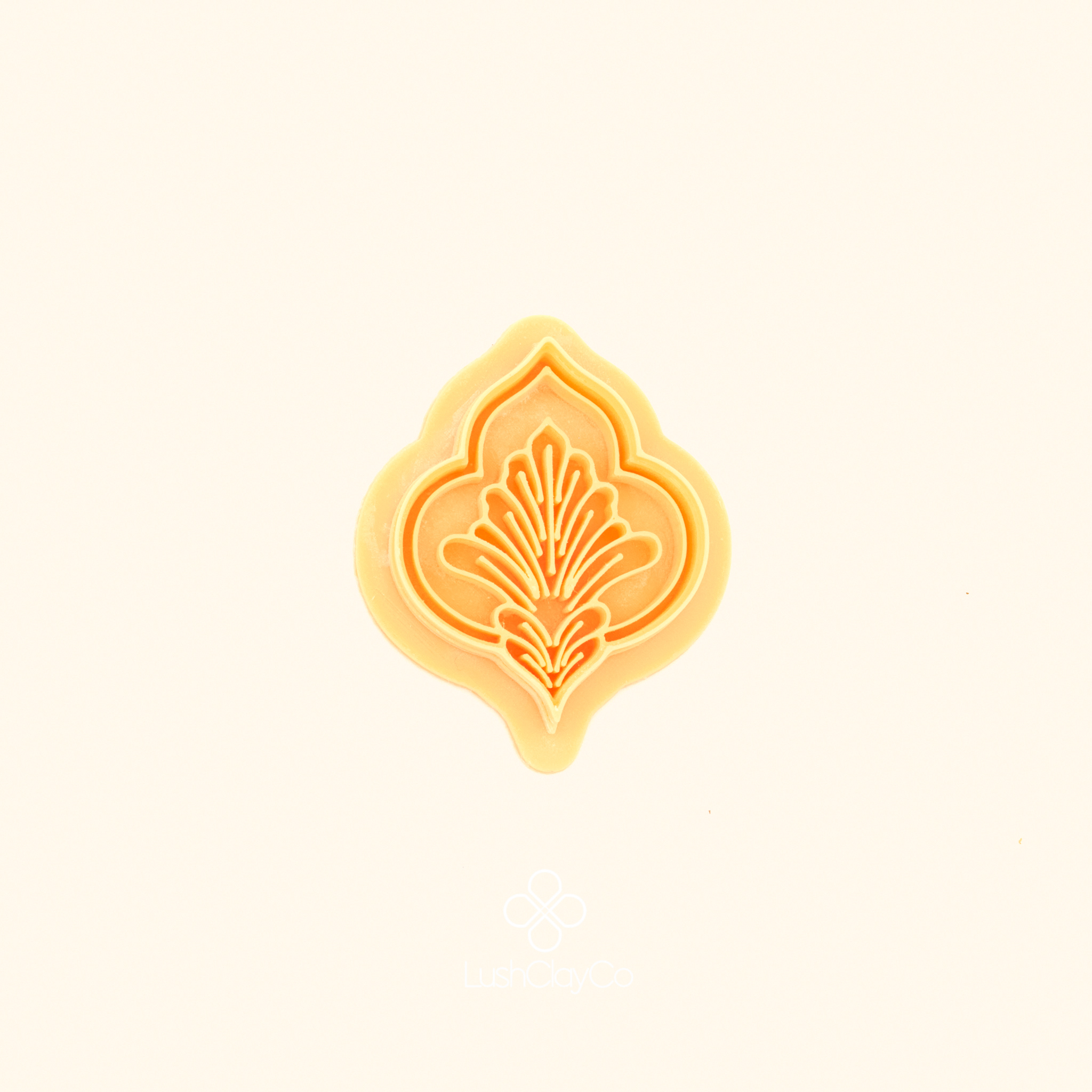 Karanfil Scroll polymer clay cutter showing pointed ogival outer silhouette with fine radiating carnation detail fanning from a central stem