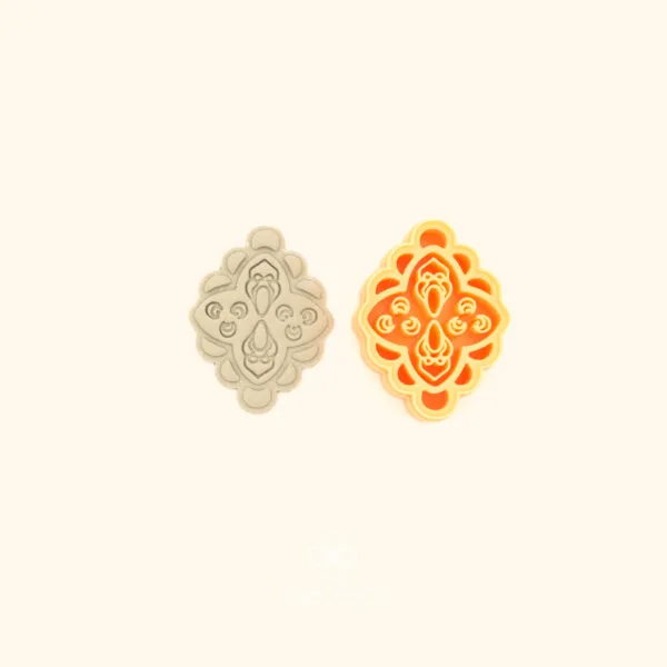 Çarkı Madalyon ottoman medallion polymer clay cutter alongside clay impression showing scalloped oval form and radial interior detail