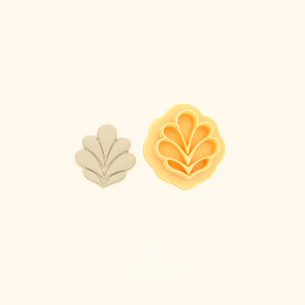 Nadir Emblem ottoman polymer clay cutter alongside clay impression showing five rounded teardrop petals in a crown arrangement rising from a pointed base