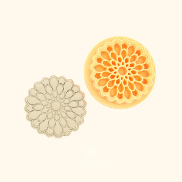 Saray Rosette ottoman polymer clay cutter alongside clay impression showing large circular rosette with multiple rings of teardrop petals spiralling to a centre point
