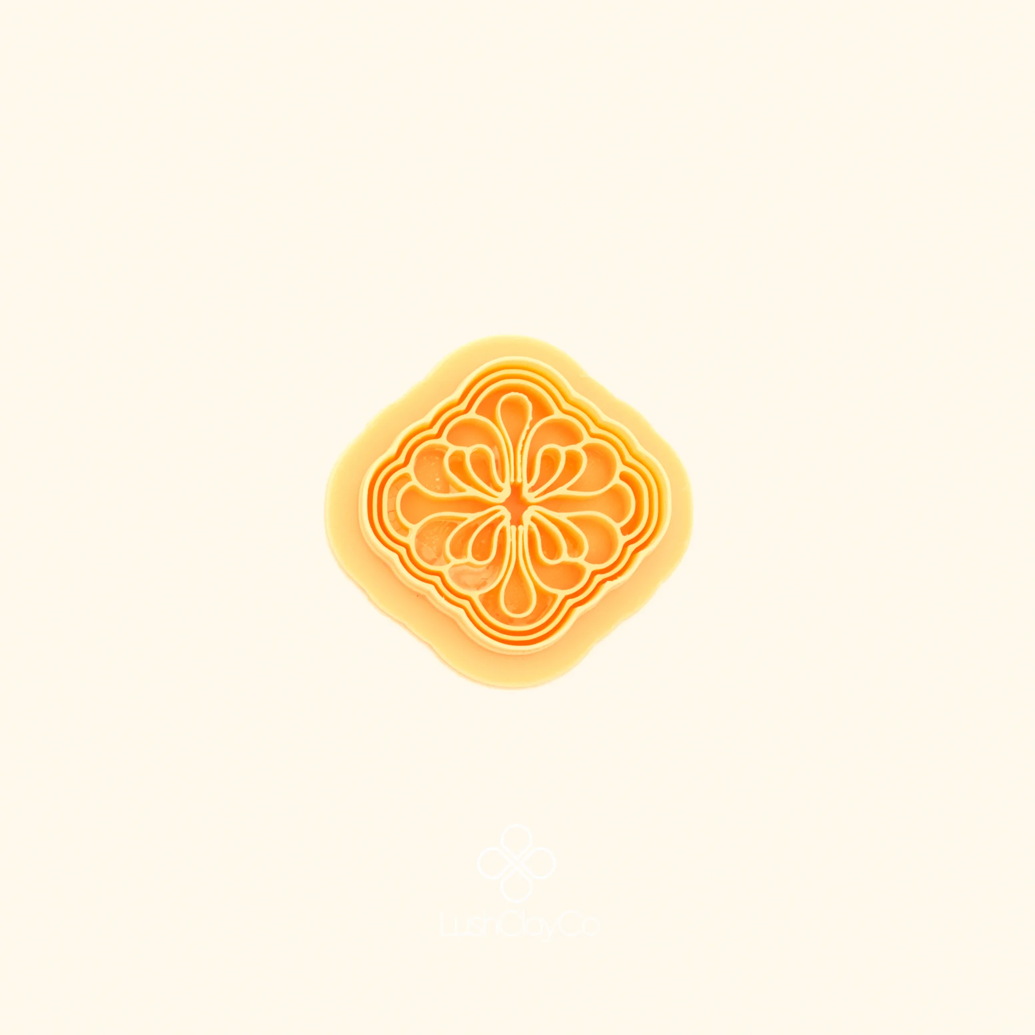 Gül Daire polymer clay cutter showing concave cornered square outer form with precise four-way symmetrical rose scroll interior detail