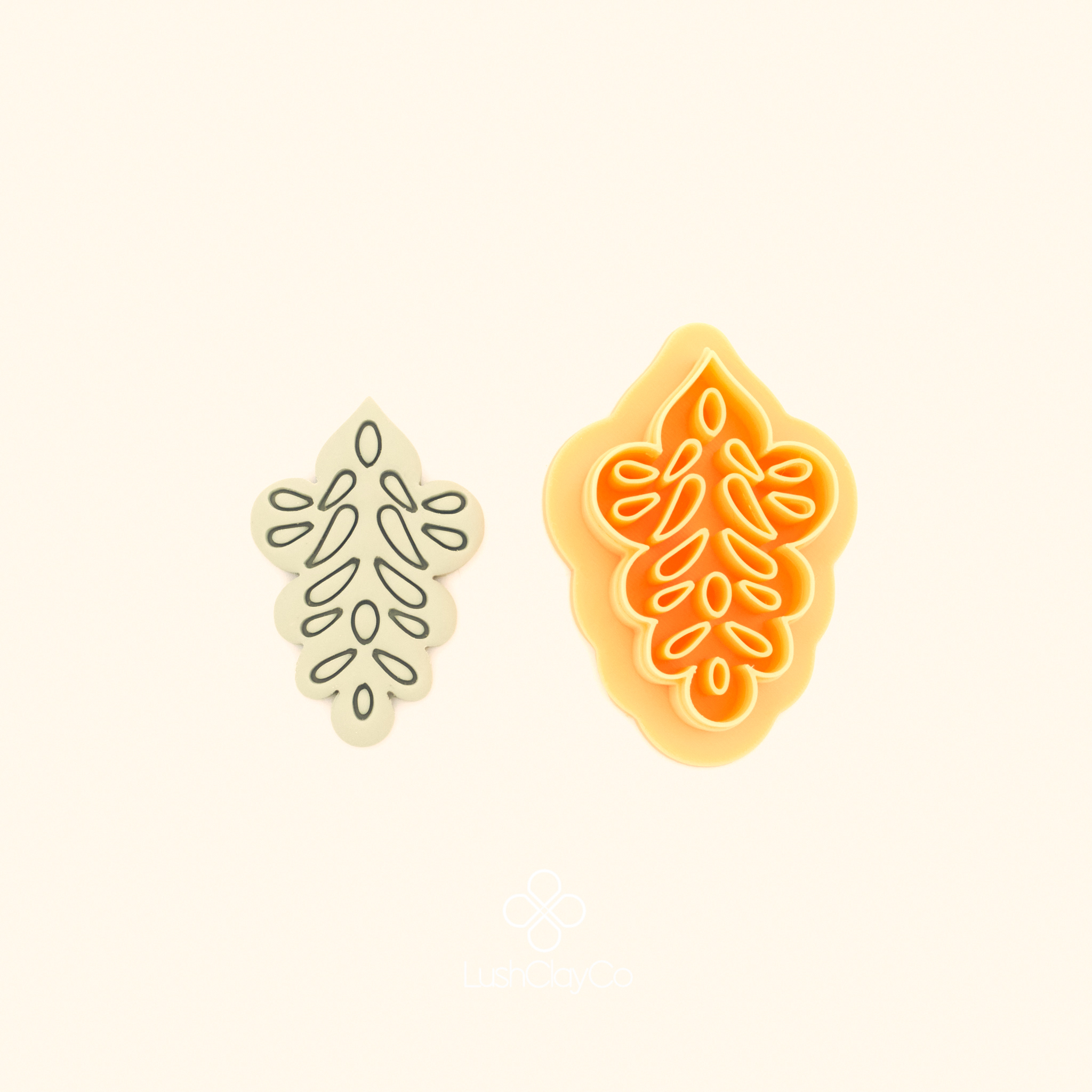 Gül Motif ottoman rose polymer clay cutter alongside clay impression showing diamond form with scalloped sides and open branching teardrop motif