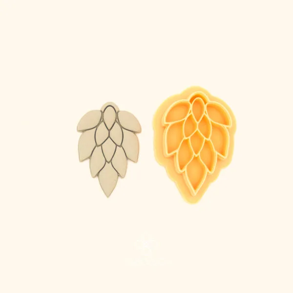 Pullu Damla rumi polymer clay cutter alongside clay impression showing teardrop silhouette with overlapping scale pattern