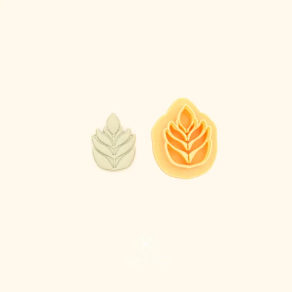 Kılıç Dalı turkish floral polymer clay cutter alongside clay impression showing teardrop shield form with three layered leaf shapes and fine vein detail