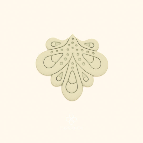 Clay impression of the Ateş Taç hatayi cutter showing wide fan spread with central ogival form and dotted berry cluster detail pressed into polymer clay