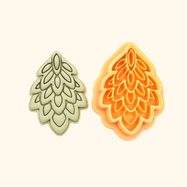 Ejder Zırhı polymer clay cutter and its clay impression, a layered scale leaf