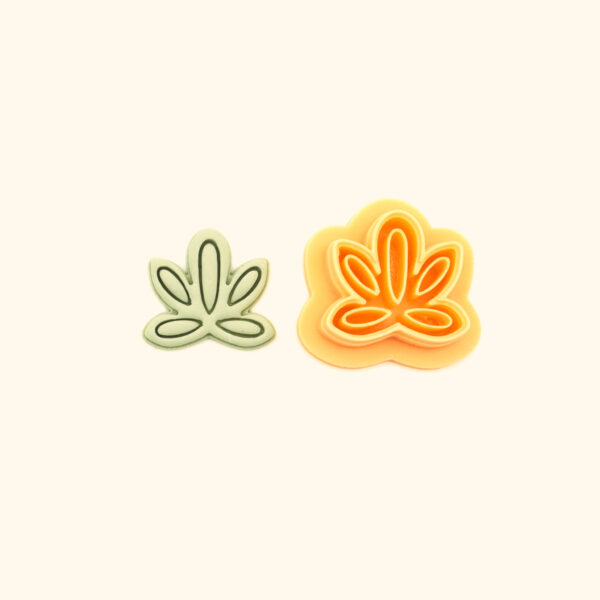 Filiz polymer clay cutter and its clay impression, a small palmet leaf spray