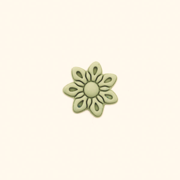 Papatya Flower Clay Cutter Impression Clay impression from the Papatya polymer clay cutter showing petal and centre detail