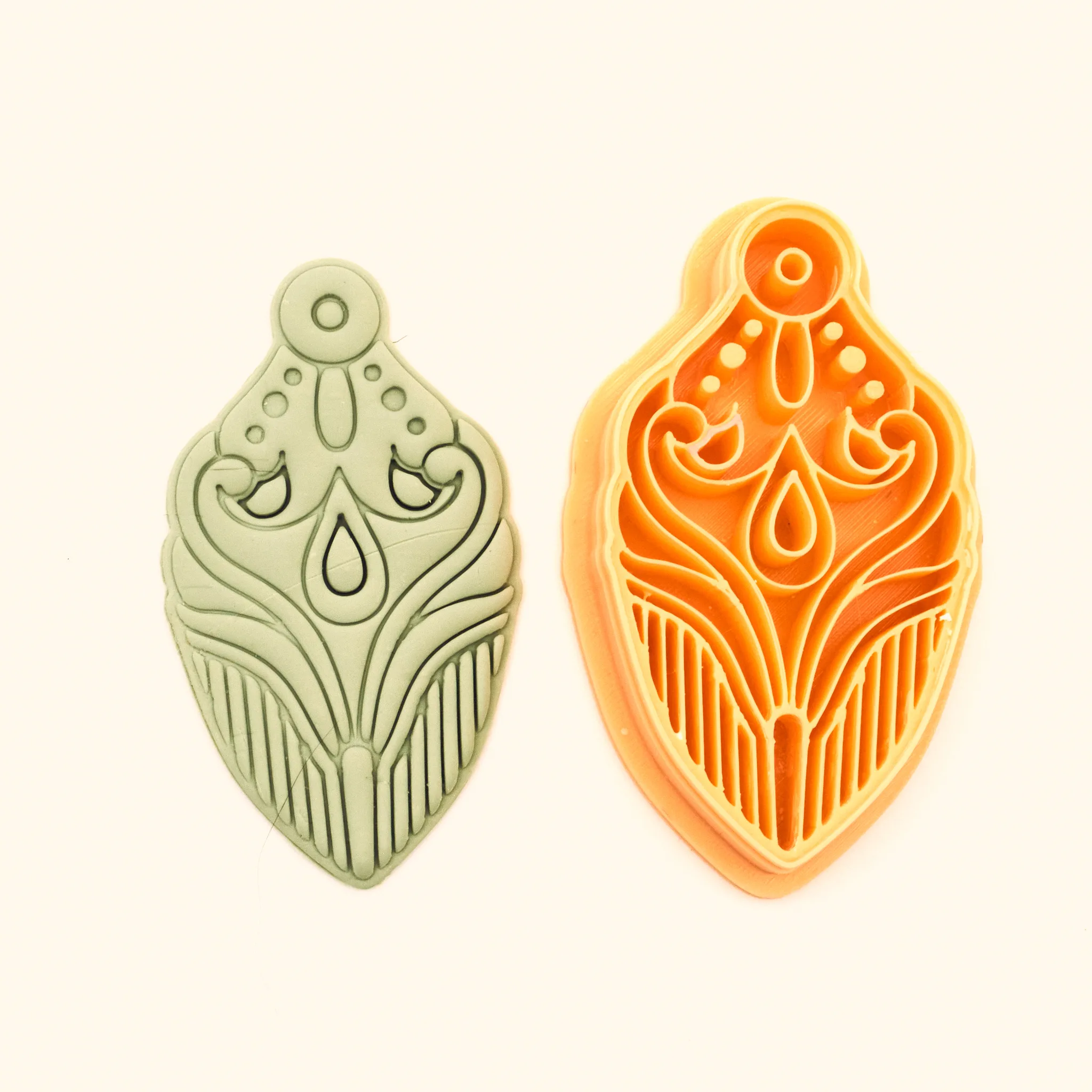Şebnem polymer clay cutter and its clay impression, a symmetric teardrop pendant design